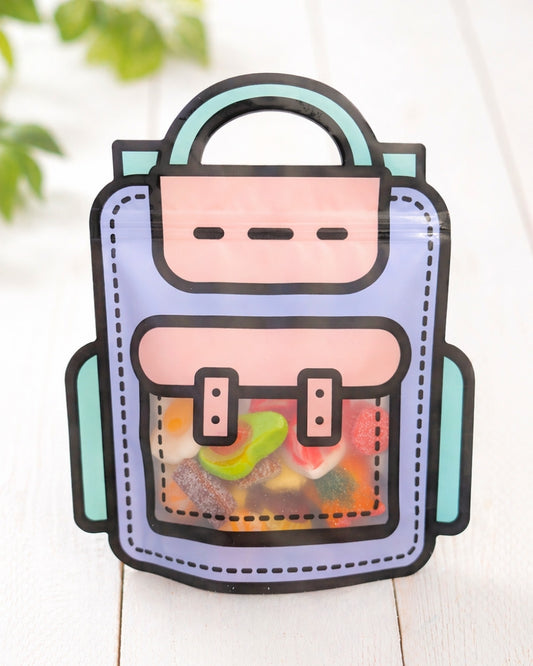 Spaßtüte in der Vorderansicht, gefüllt mit bunten Süßigkeiten und als Produktfoto hochwertig dargestellt.